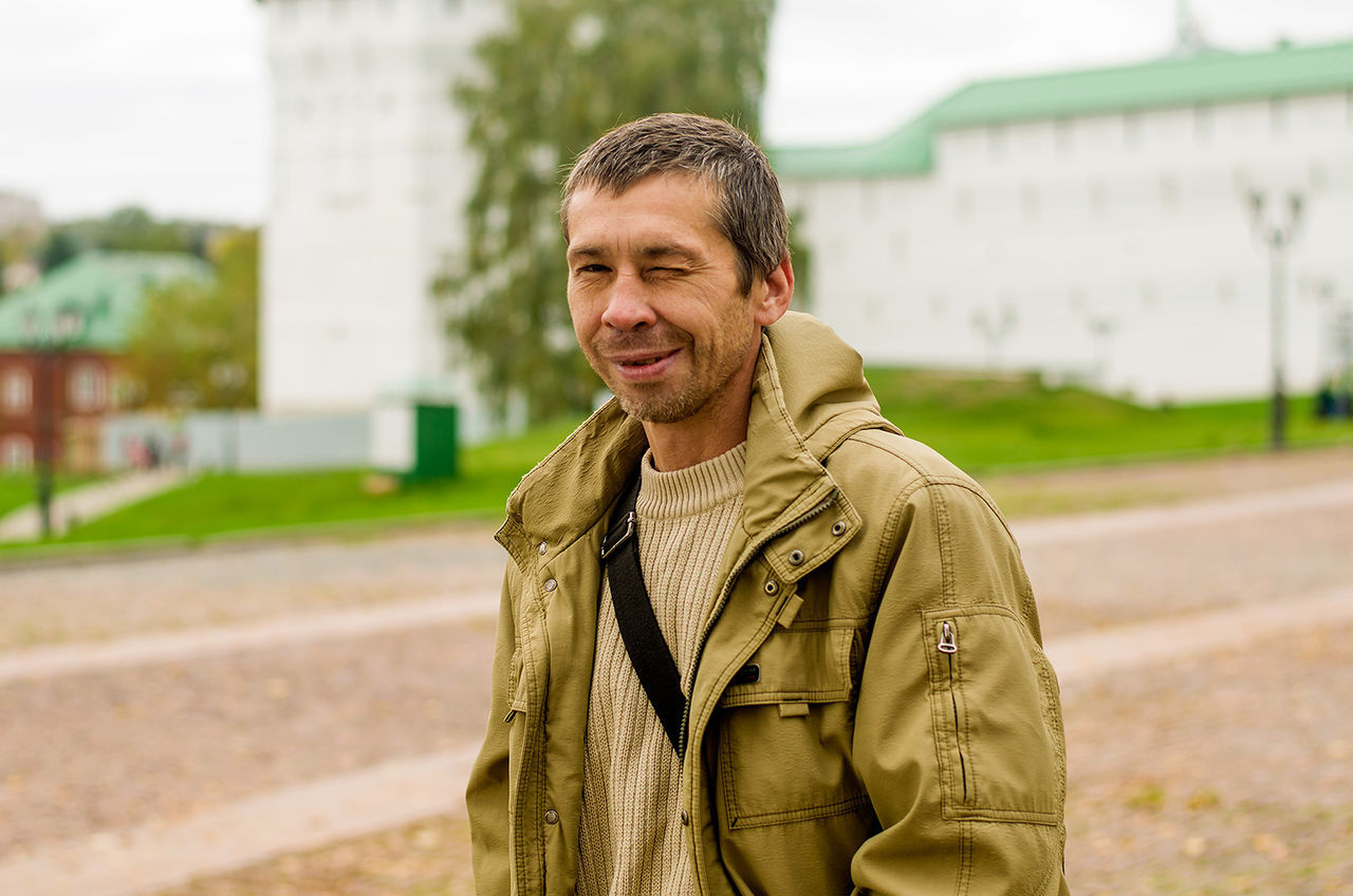 Portrait of man smiling outdoors