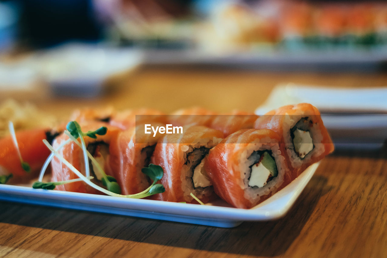 CLOSE-UP OF SUSHI ON TABLE