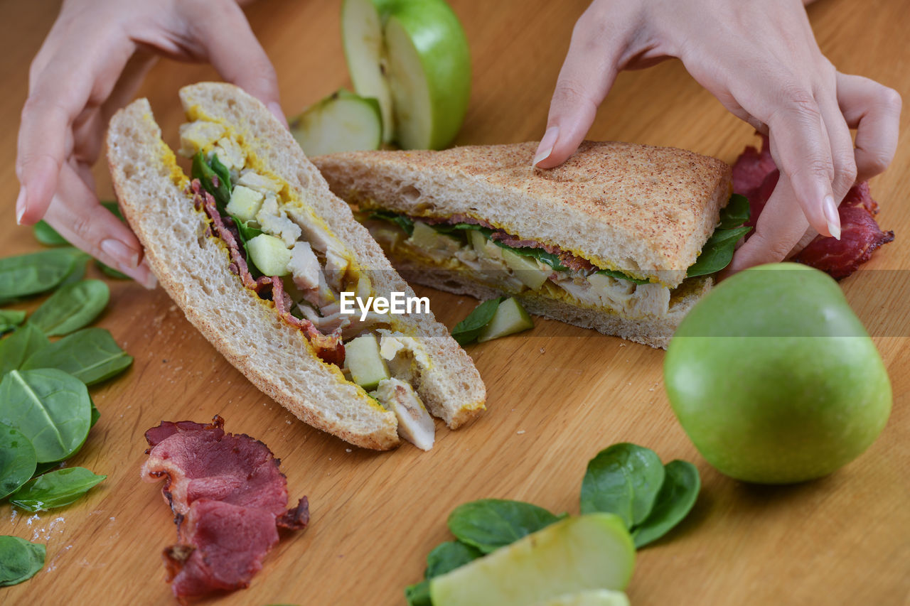 Close up of woman's hands with vegetables