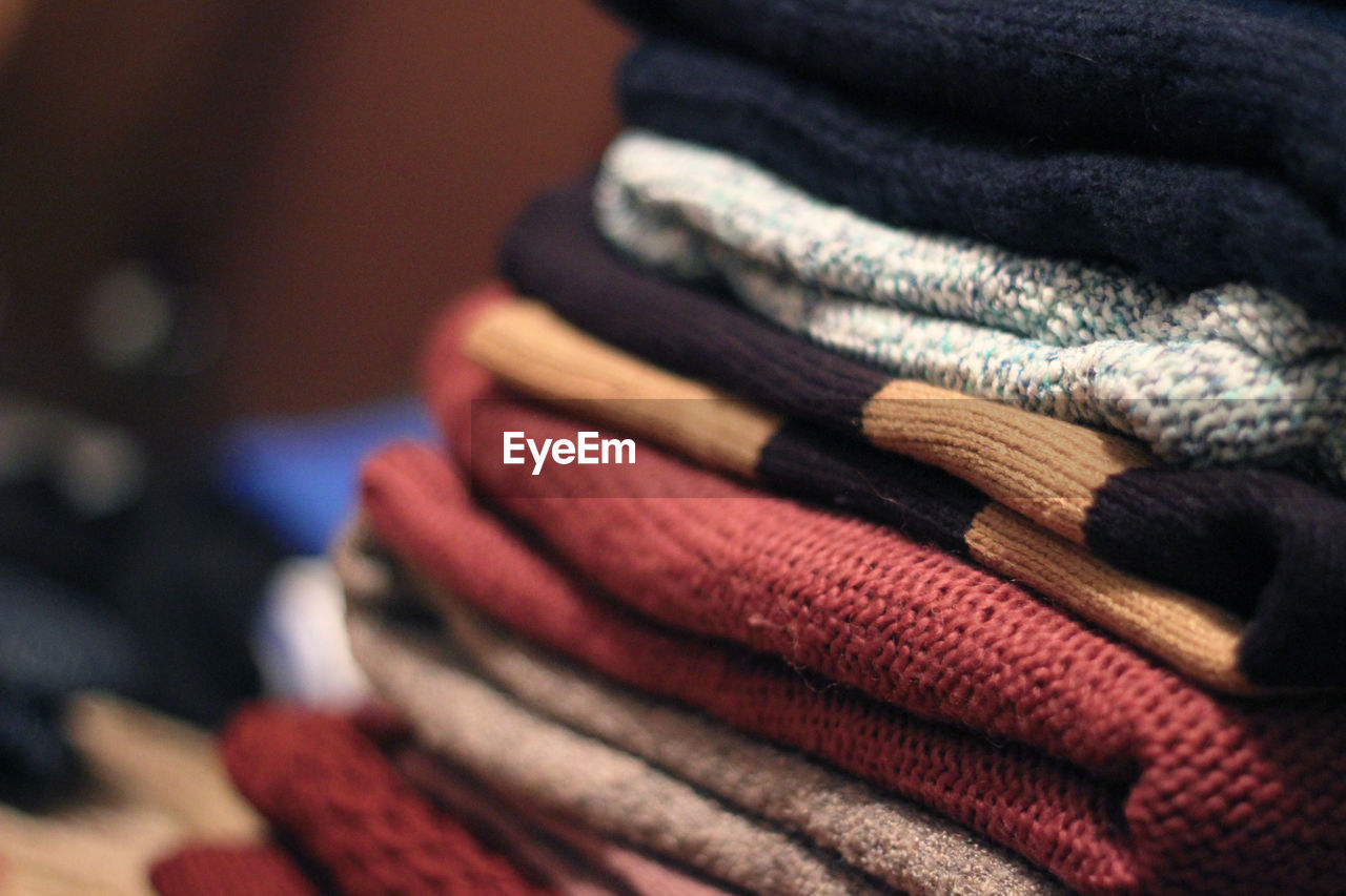 Close-up of folded sweaters