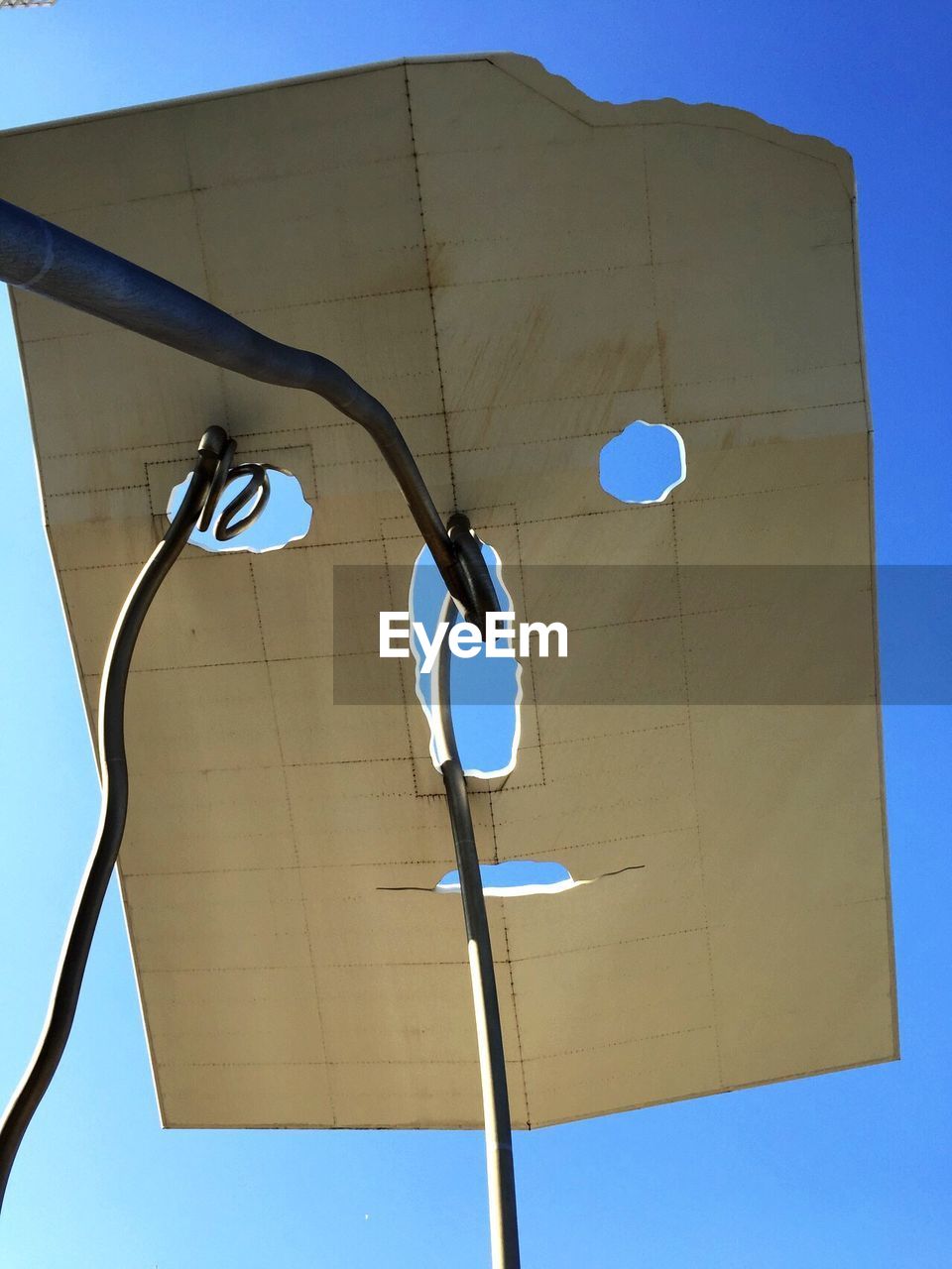 Low angle view of building against clear blue sky