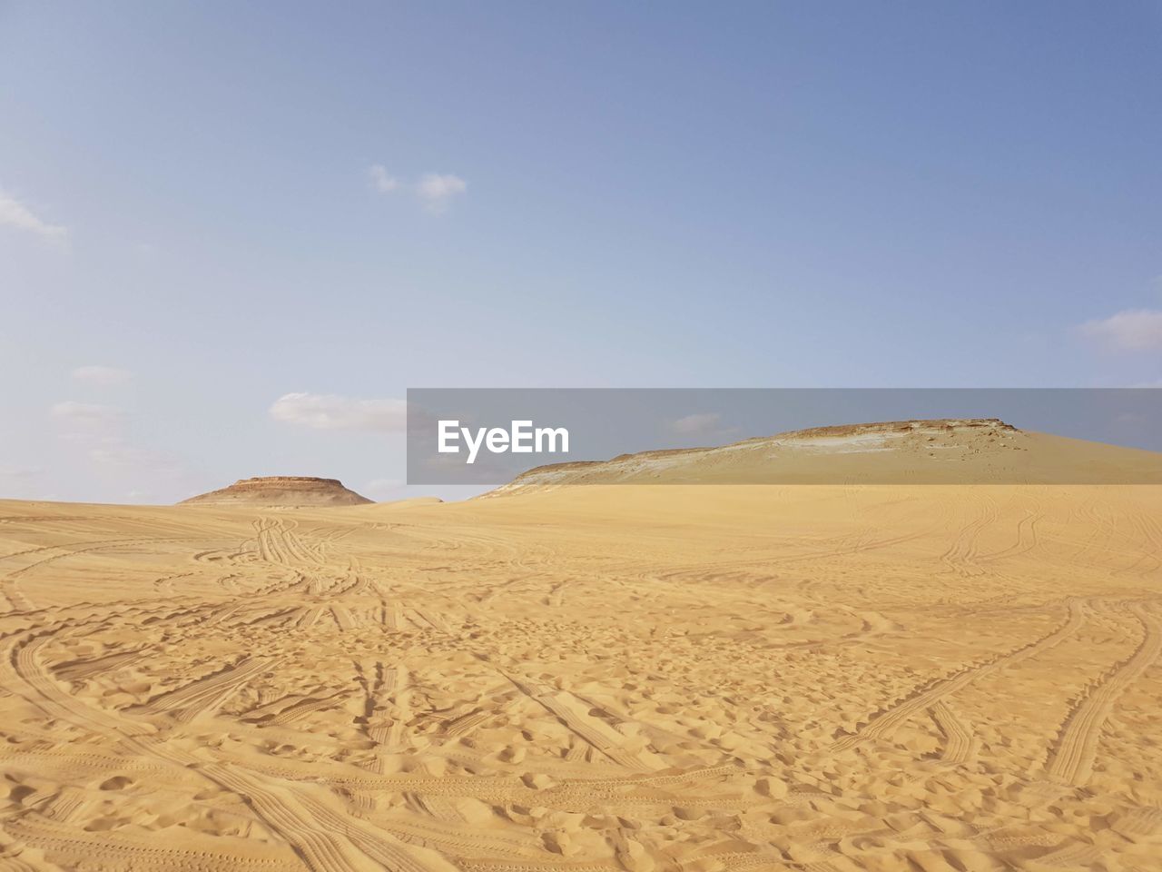 Scenic view of desert against sky