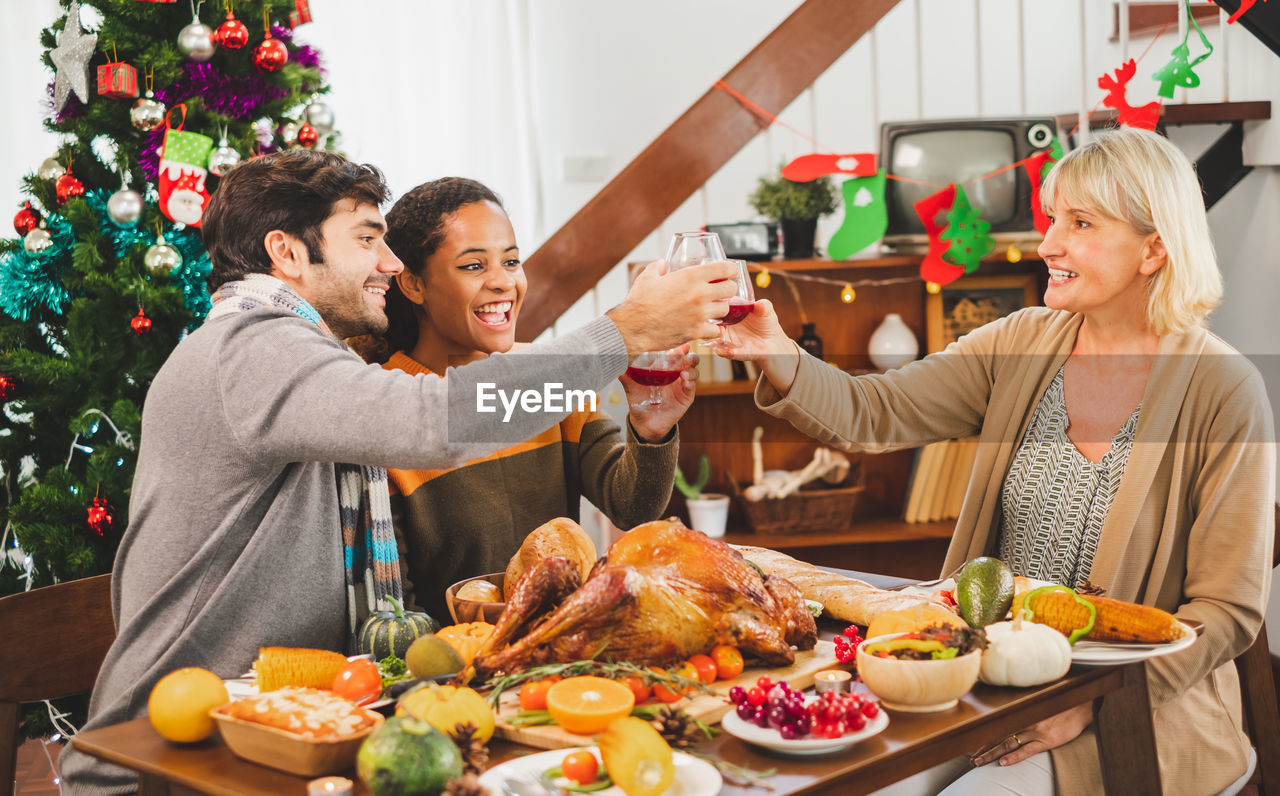 People having dinner during christmas