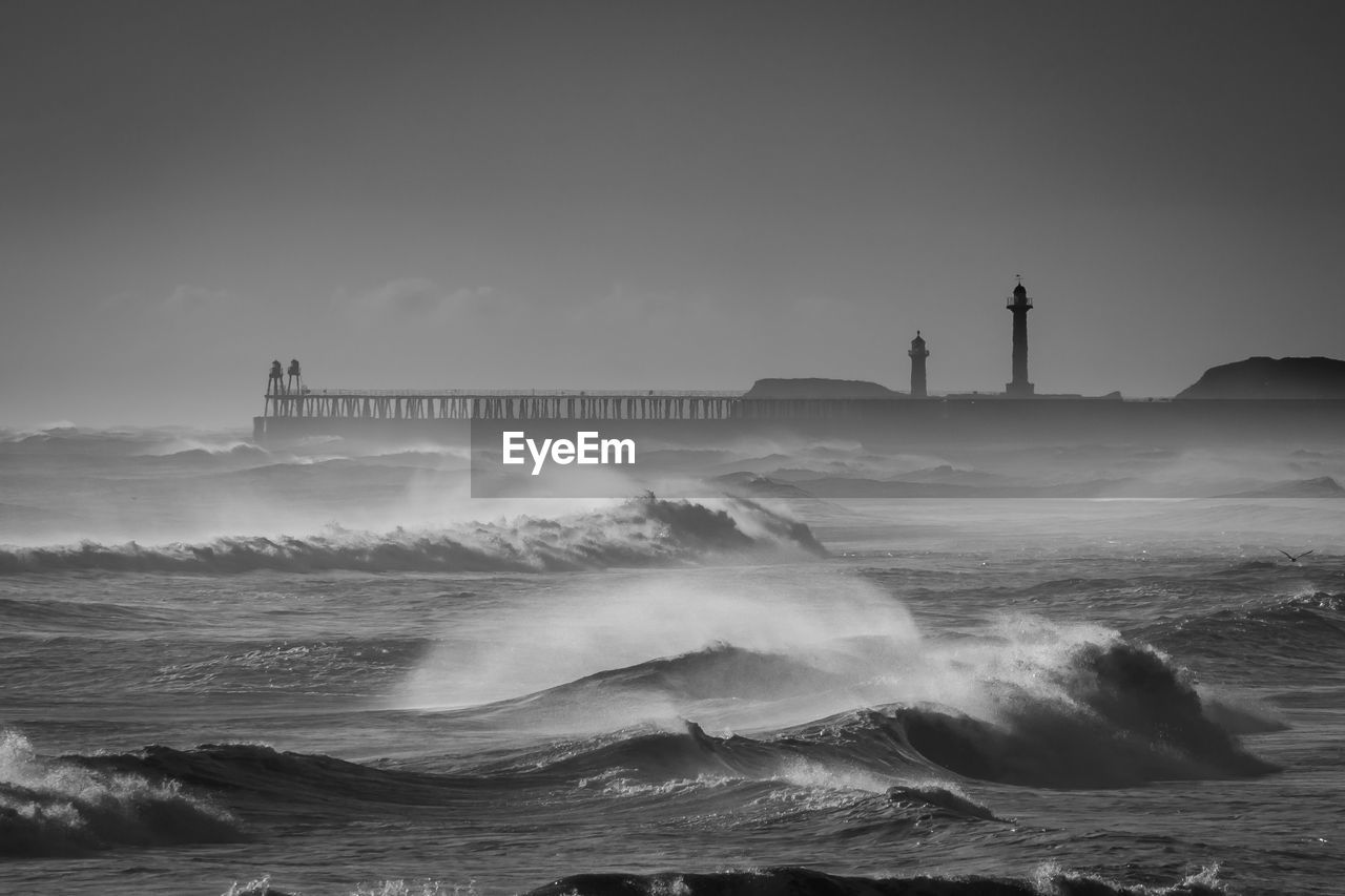 Scenic view of sea against sky whitby rough seas