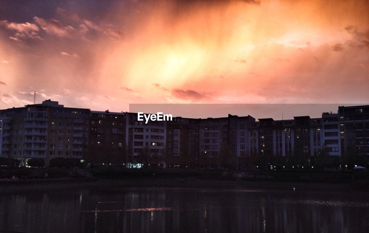 Sunset sky over city buildings