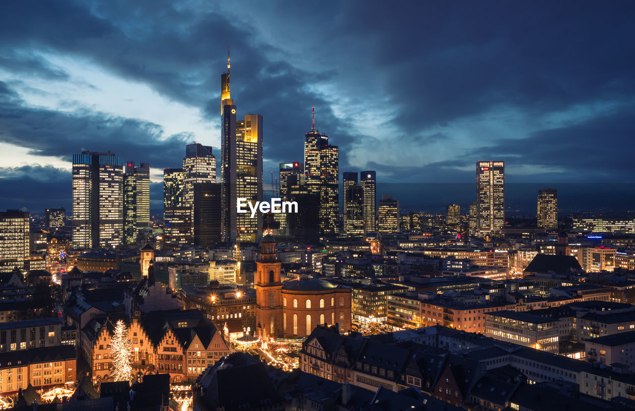 Old and new live together in this beautiful night view of frankfurt, shot from the cathedral
