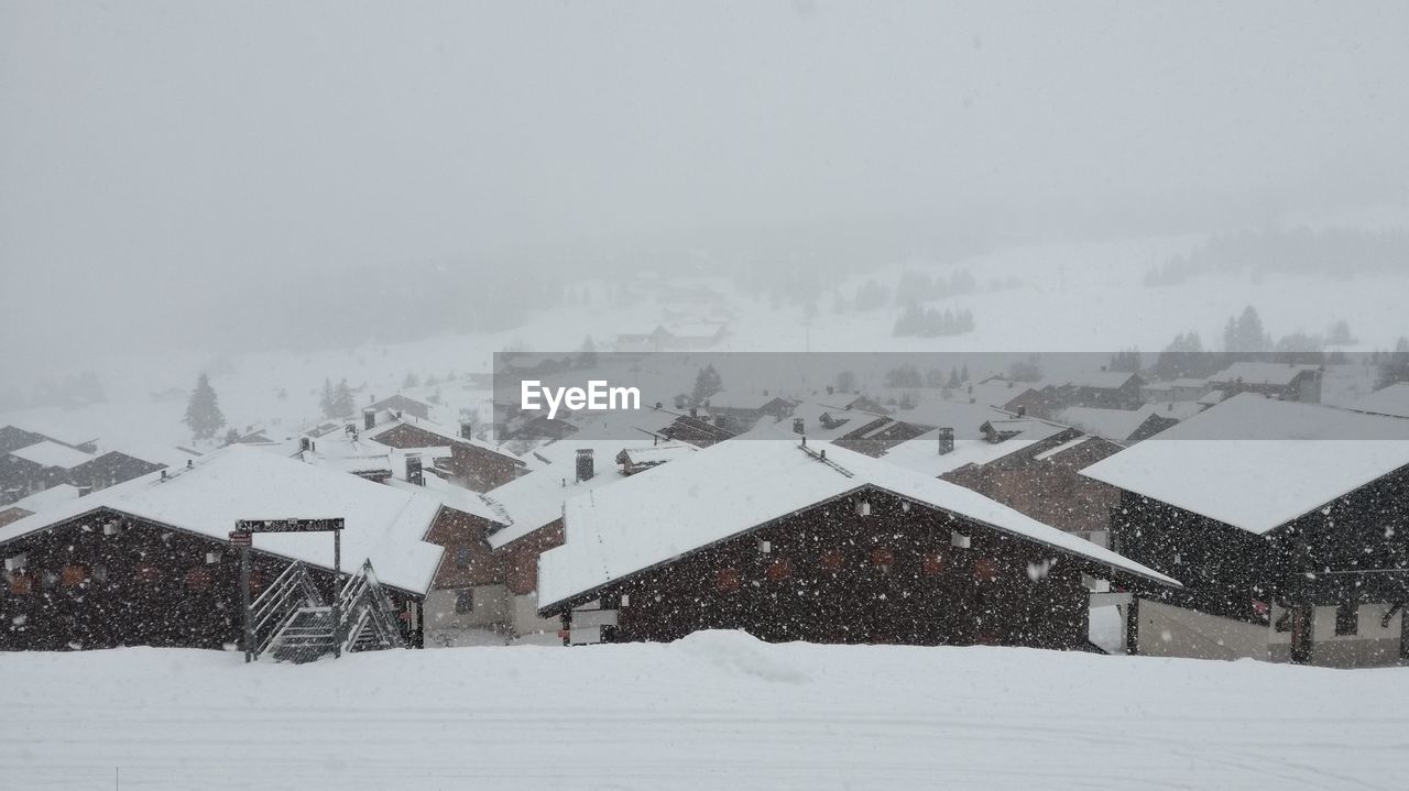 Scenic view of mountains against sky during winter