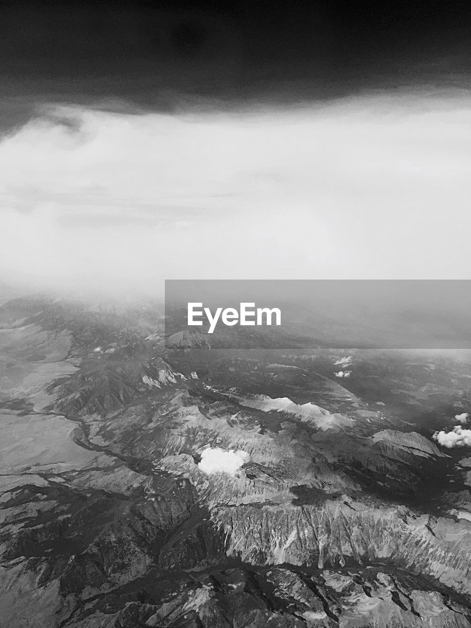 Aerial view of mountains against sky