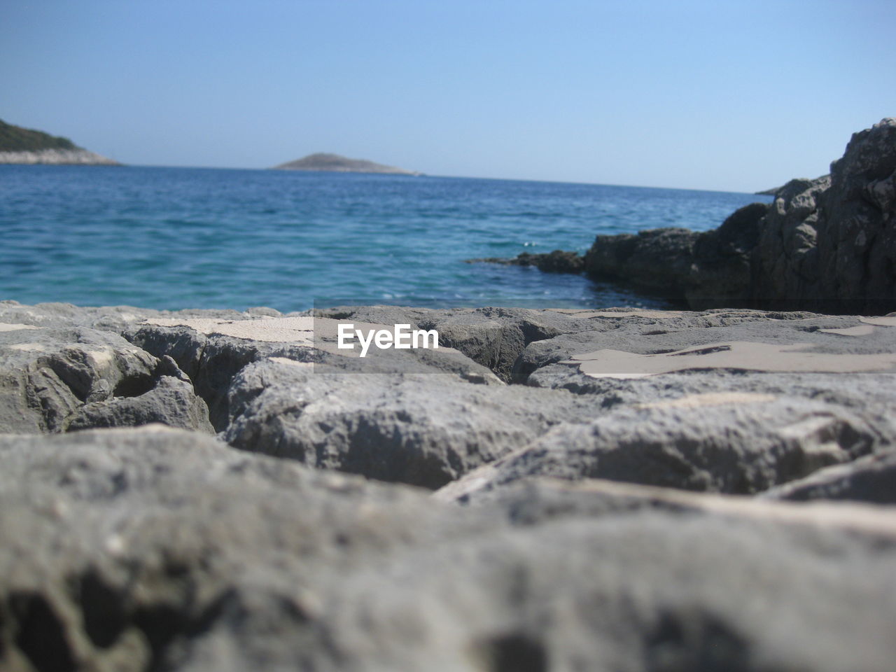 Scenic view of sea against clear sky