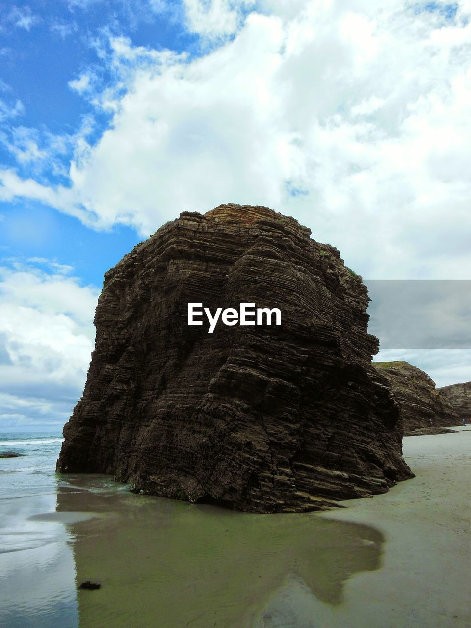 Low angle view of rock formation on beach