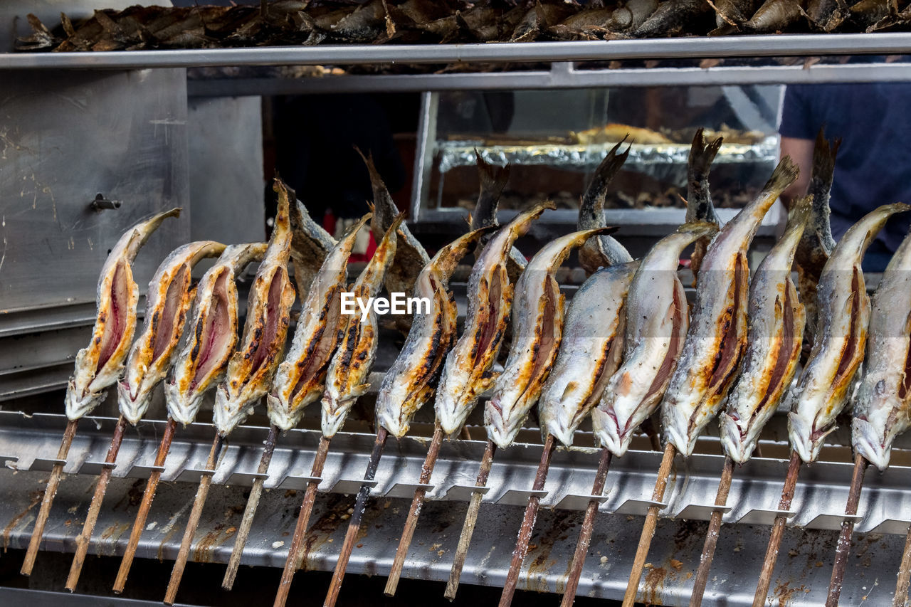 CLOSE-UP OF SEAFOOD ON BARBECUE