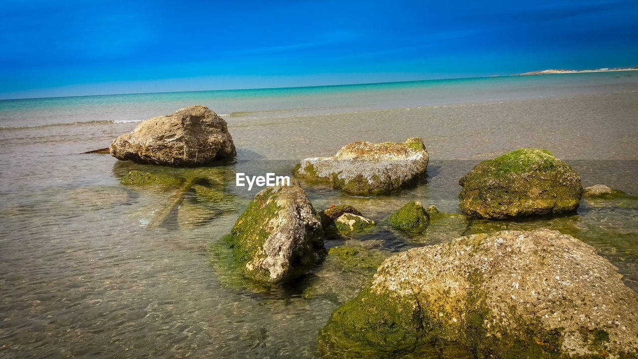 ROCKS ON SHORE
