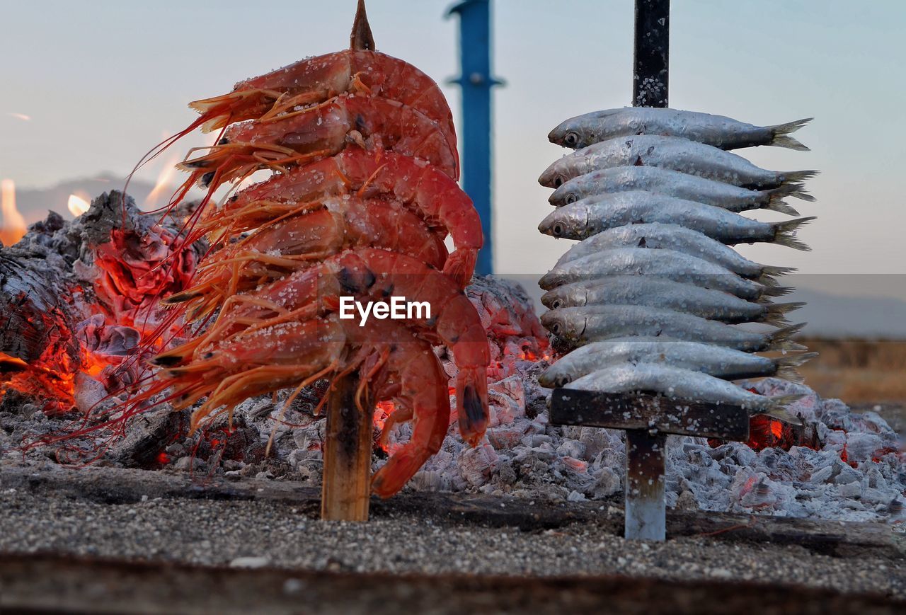 Seafood skewers by fire