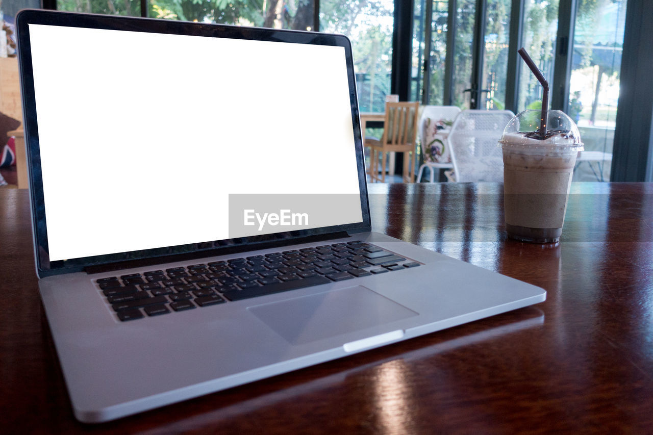 Close-up of laptop on table