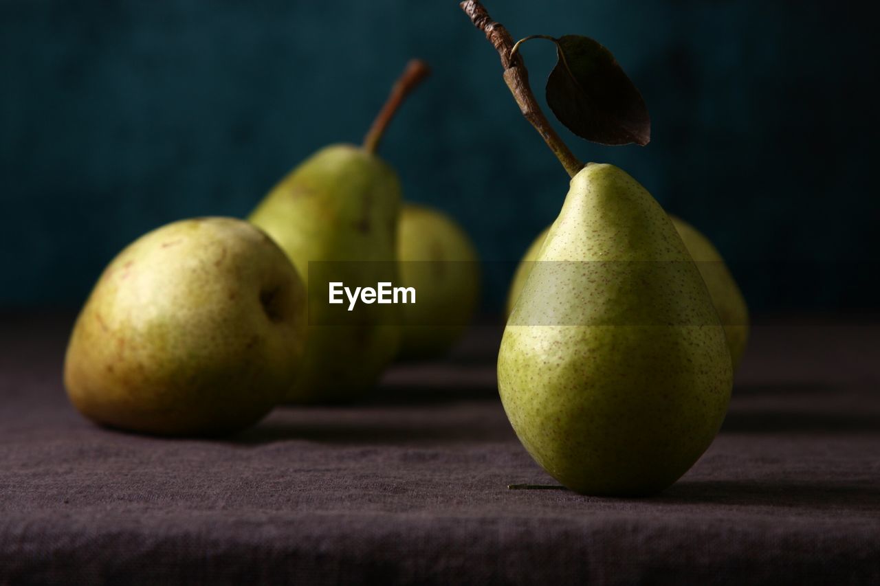 Close-up of pears on table