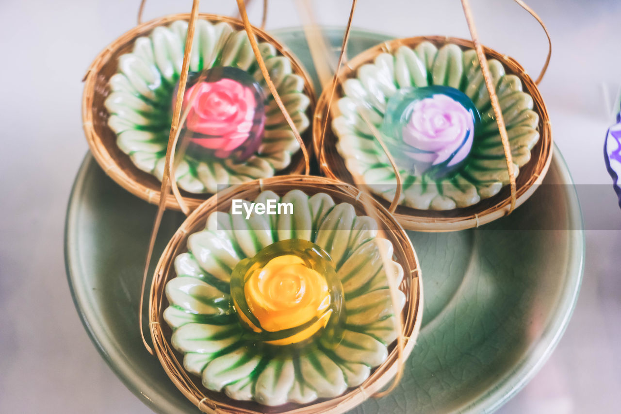 food and drink, food, sweet food, cupcake, sweet, cake, dessert, freshness, no people, flower, icing, baked, plate, indoors, healthy eating, celebration, multi colored, still life, fruit, decoration, table, close-up, flowering plant, high angle view