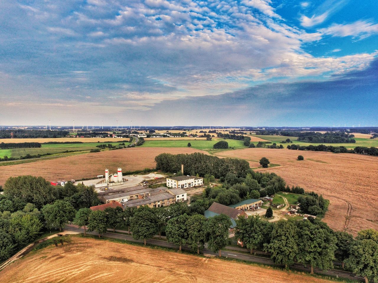 AGRICULTURAL FIELD AGAINST SKY