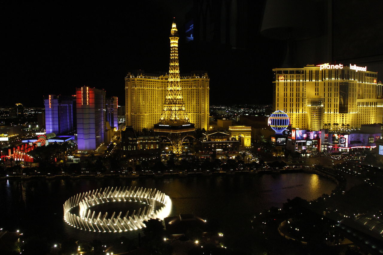 ILLUMINATED SKYSCRAPERS AT NIGHT