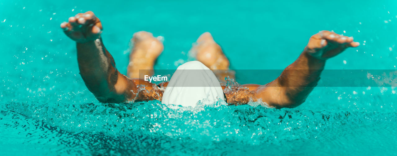 Female athlete swimming in pool