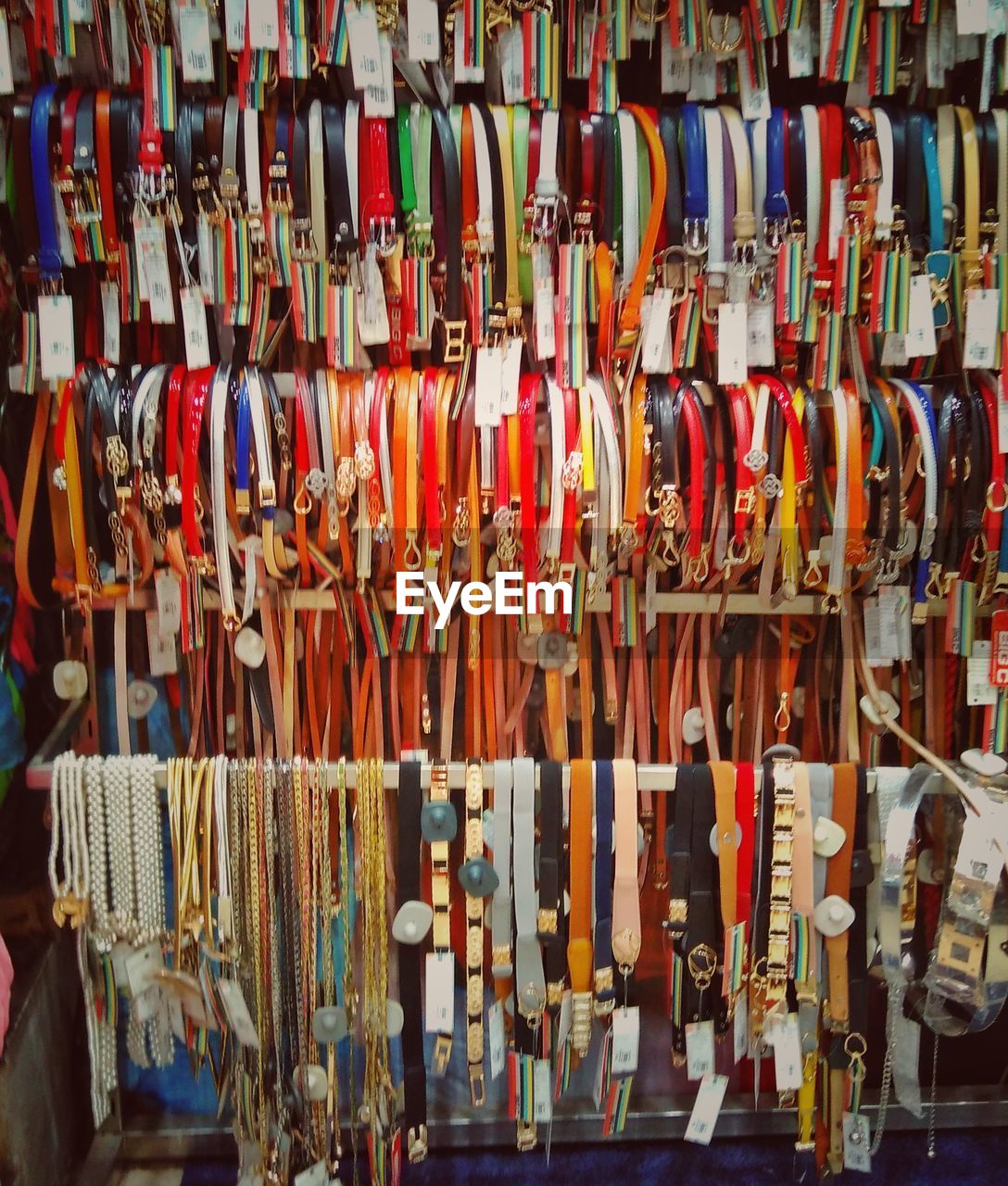 FULL FRAME SHOT OF MULTI COLORED UMBRELLAS HANGING