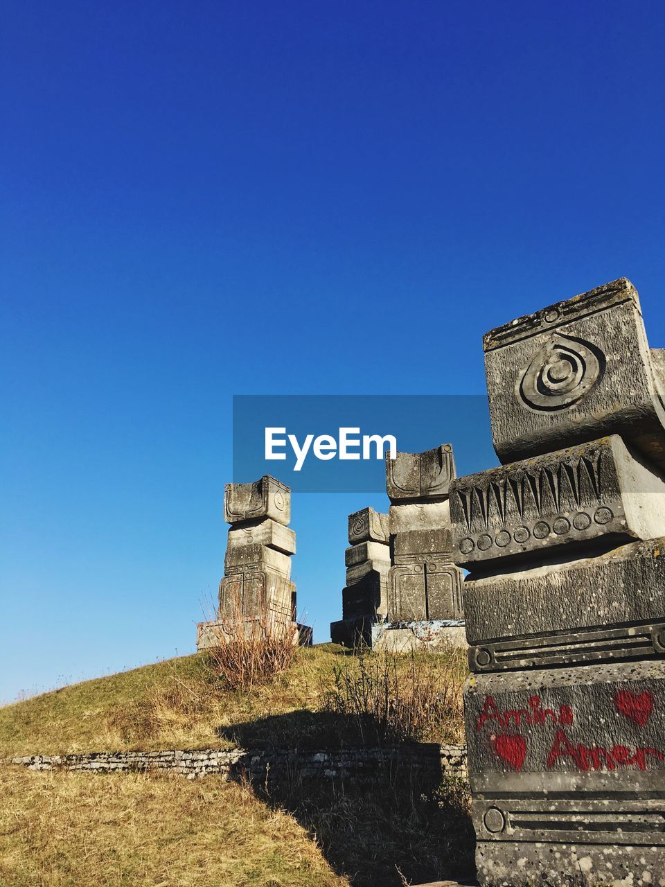 LOW ANGLE VIEW OF FORT AGAINST CLEAR BLUE SKY