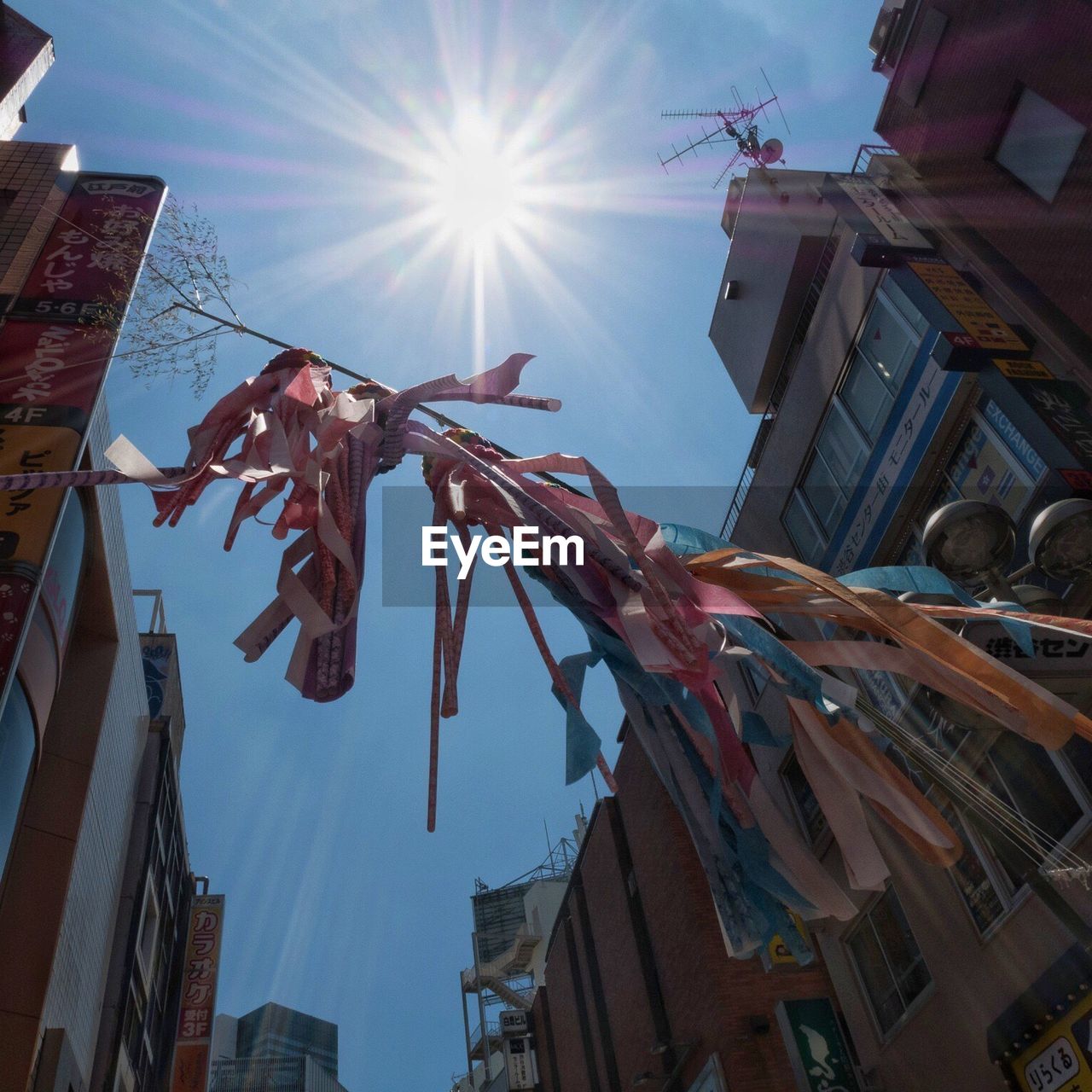 LOW ANGLE VIEW OF CLOTHES DRYING ON TOWN