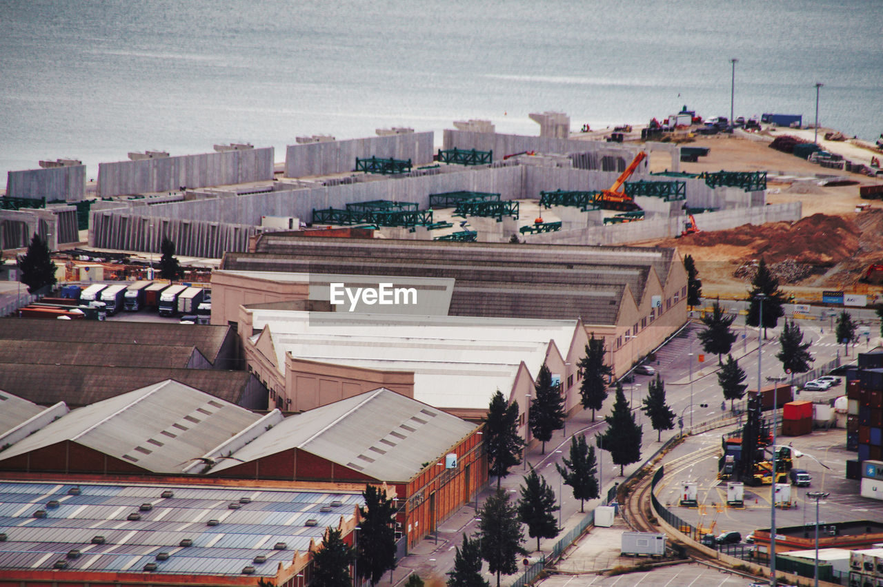 High angle view of buildings in city against sky