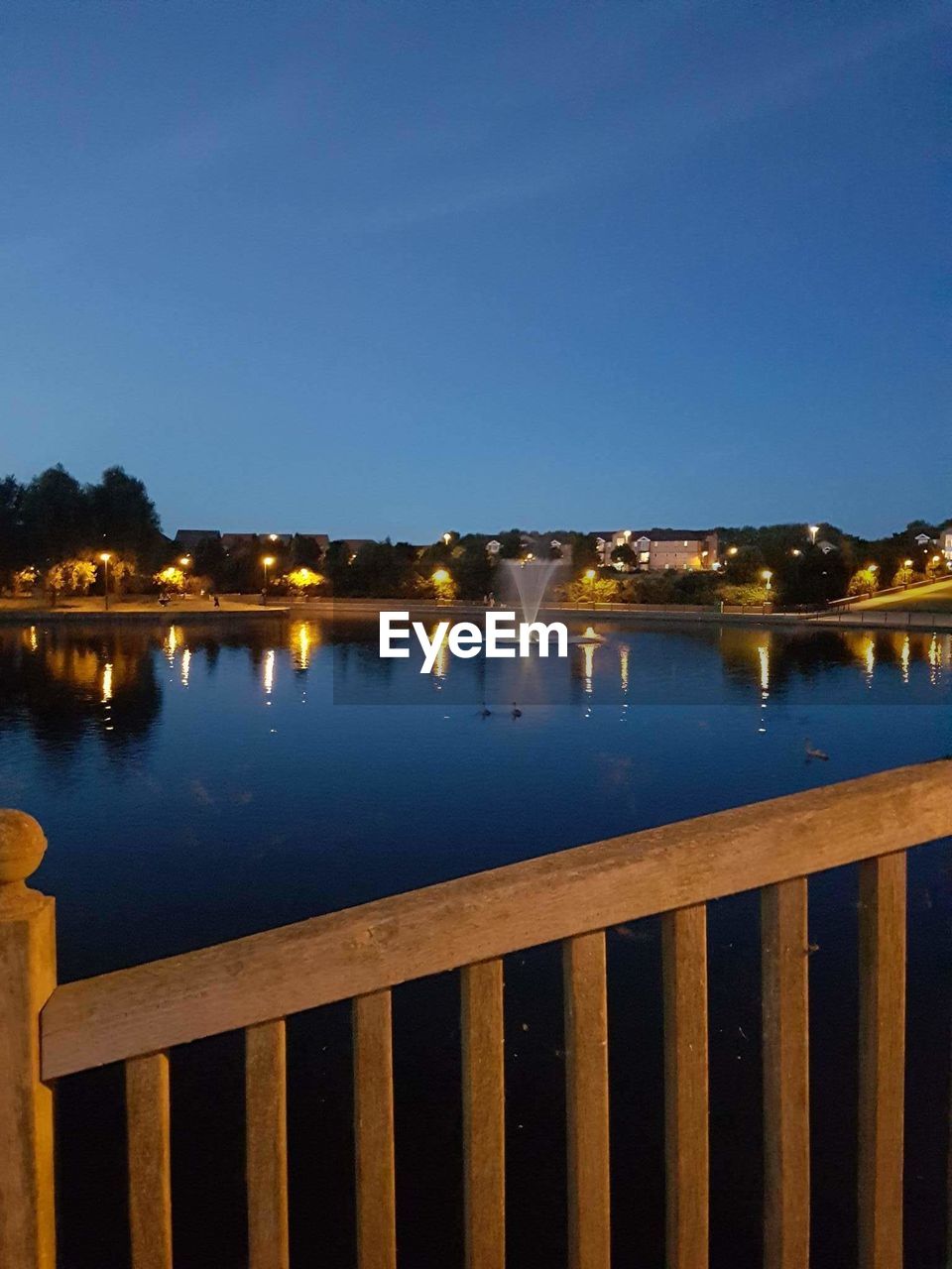 VIEW OF BRIDGE OVER CALM SEA