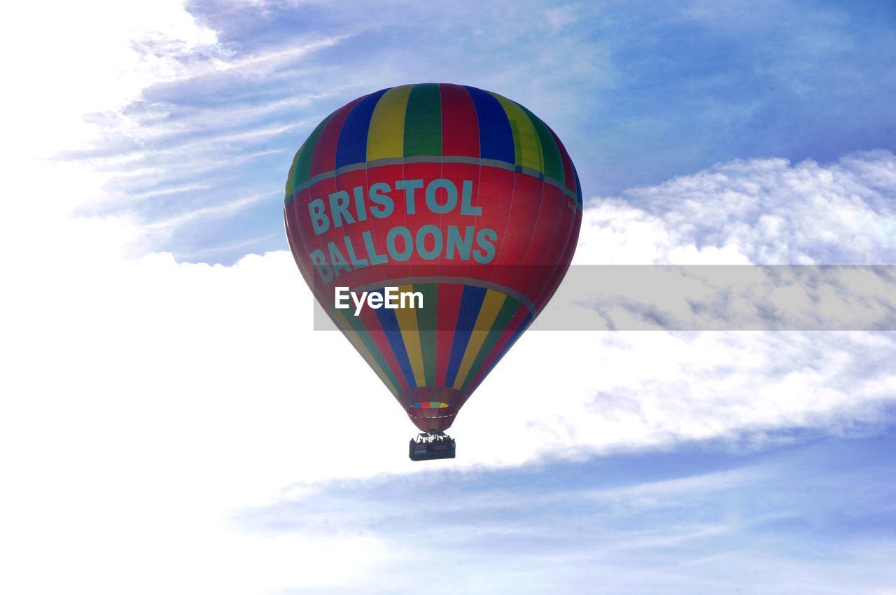 LOW ANGLE VIEW OF HOT AIR BALLOONS AGAINST SKY