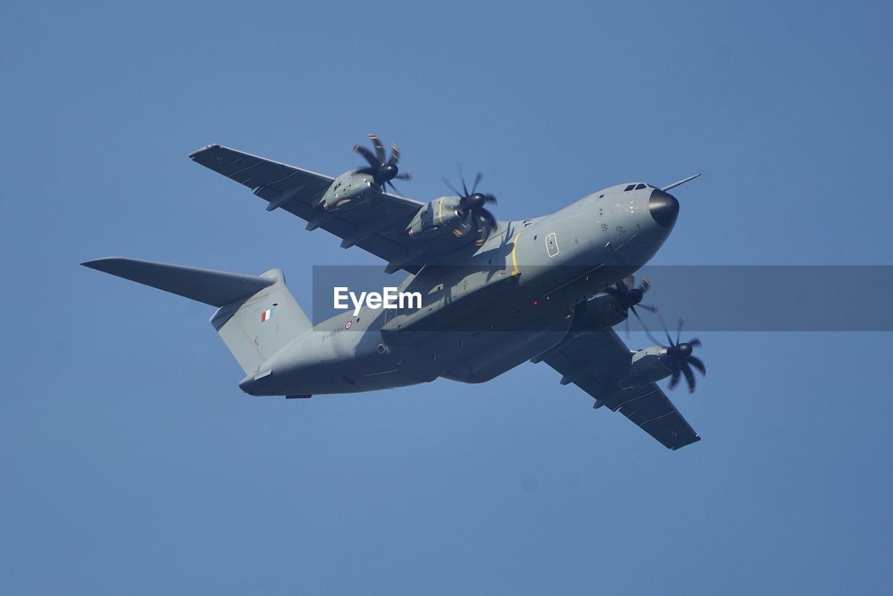 air vehicle, airplane, flying, military, transportation, mode of transportation, sky, vehicle, military transport aircraft, aircraft, on the move, military aircraft, aviation, blue, army, air force, fighter plane, military airplane, motion, clear sky, plane, nature, air show, aerospace industry, single object, mid-air, aircraft engine, no people, sunny, conflict, war, outdoors, fighter aircraft, fighting, cargo aircraft, military training