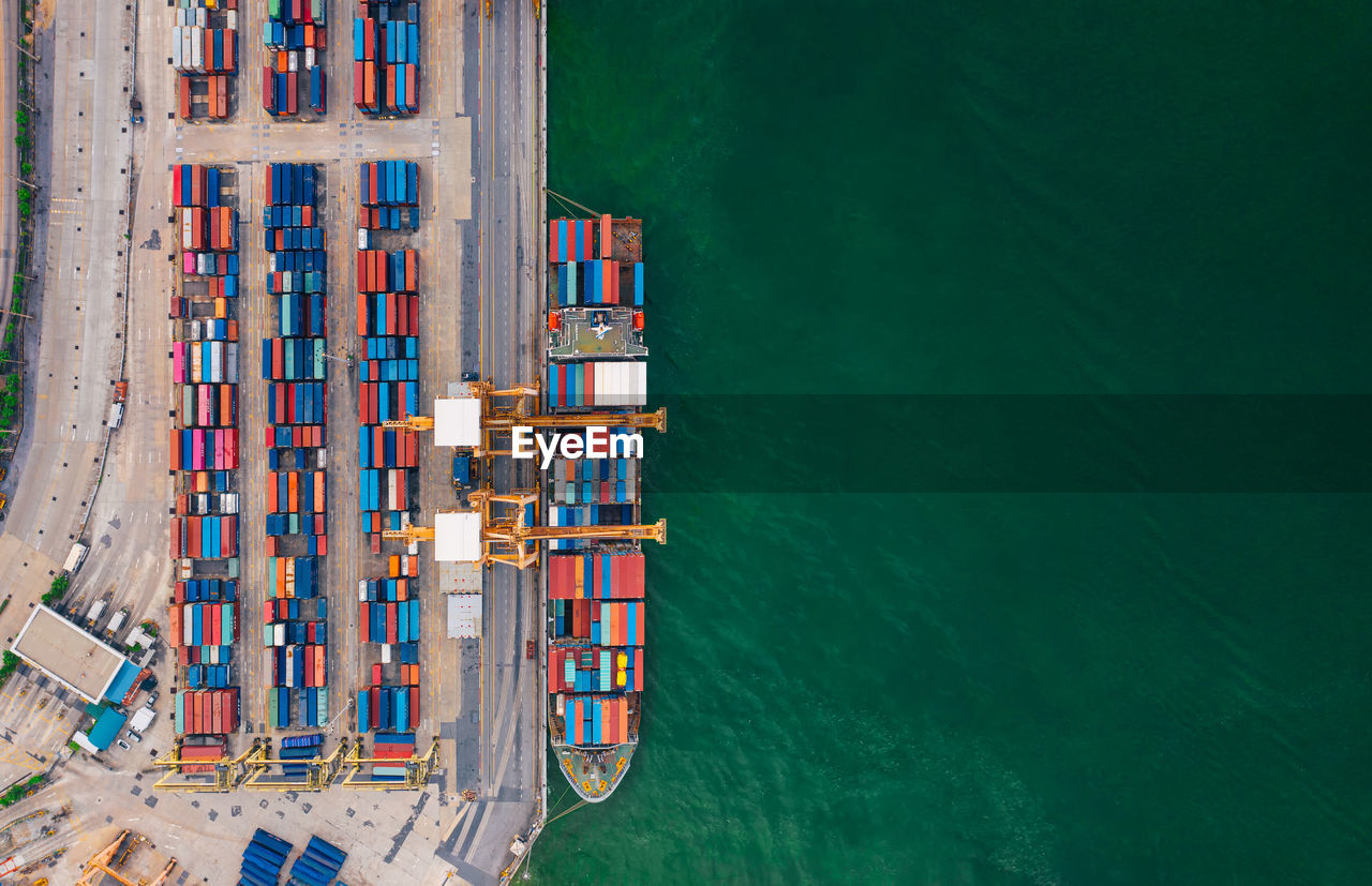 Aerial view from drone logistics and transportation of container cargo ship and cargo import export 