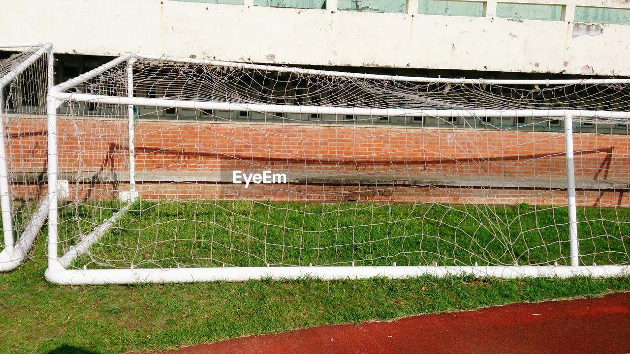 VIEW OF SOCCER FIELD AGAINST WALL