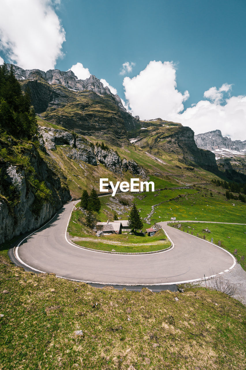 Scenic view of mountain road against sky