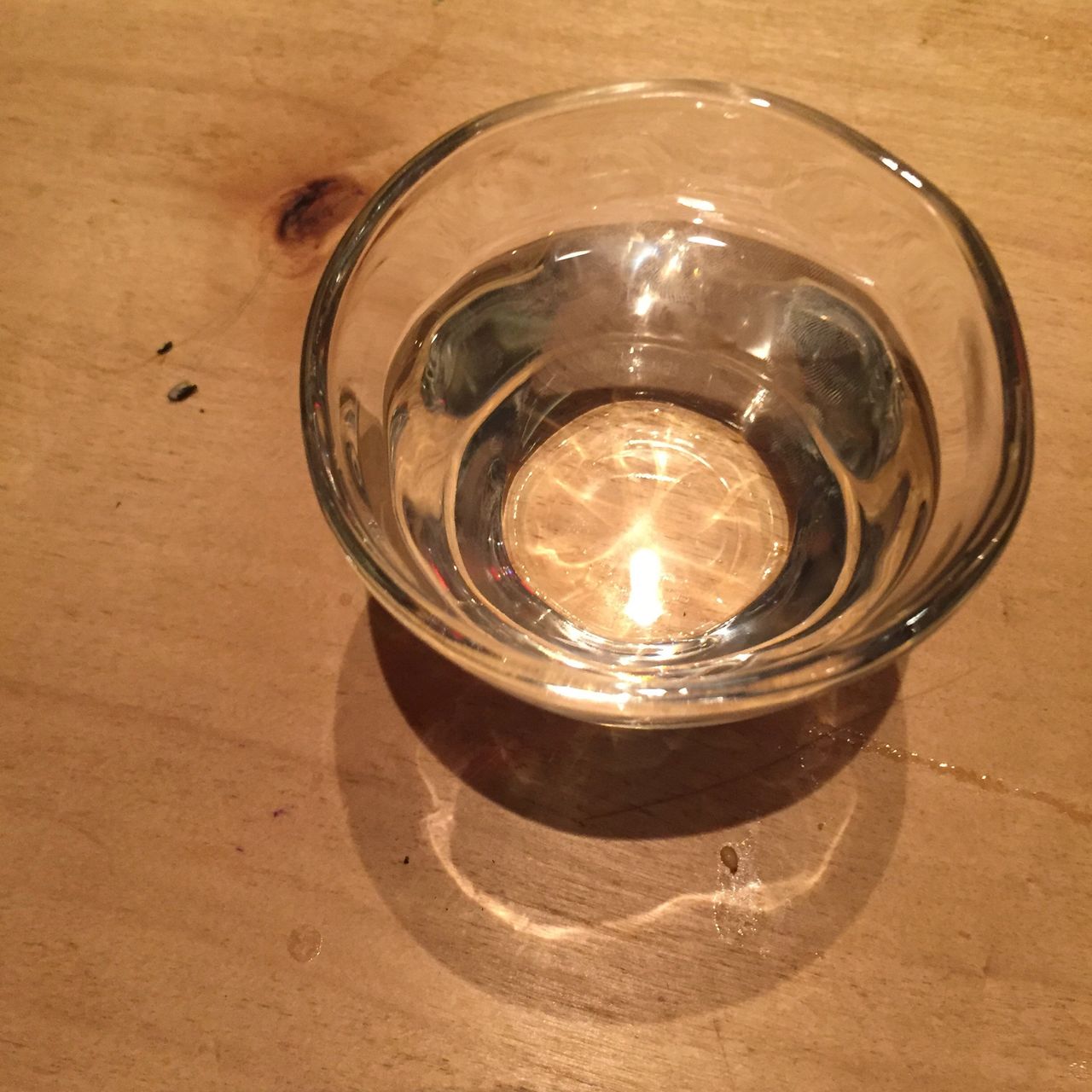High angle view of glass of water on table