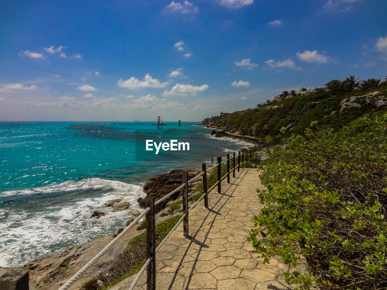 Scenic view of sea against cloudy sky