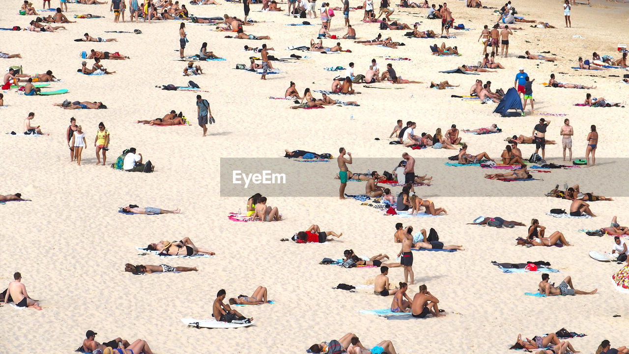 People relaxing at beach