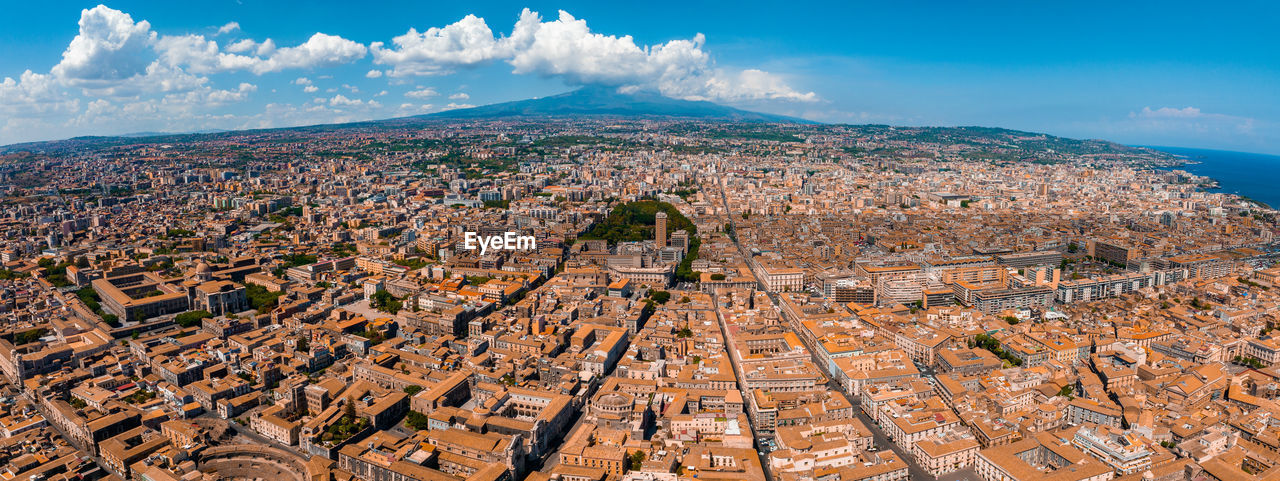 Aerial view on via etnea in catania. dome of catania and the main street with the background