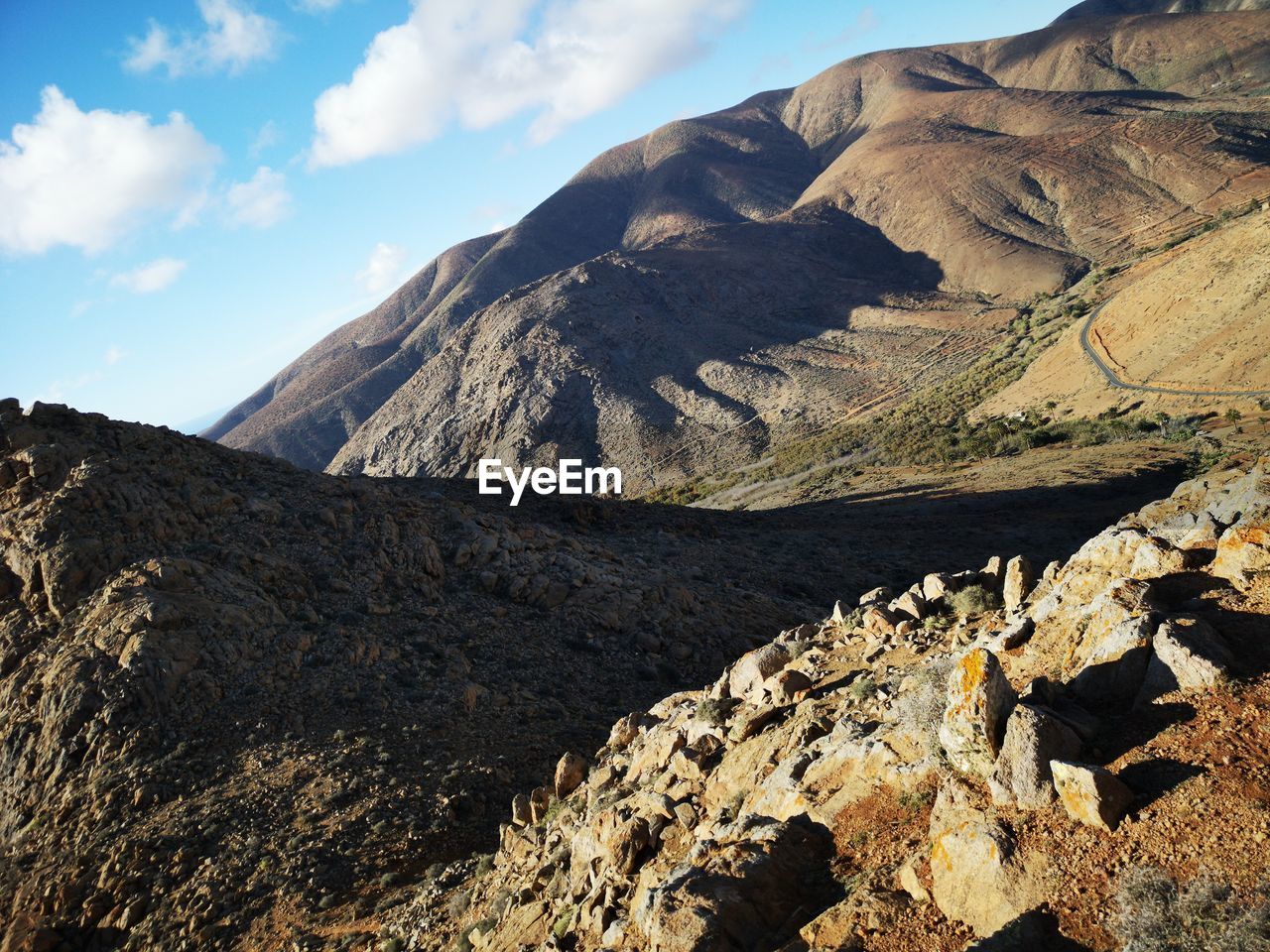 Scenic view of mountain range against sky