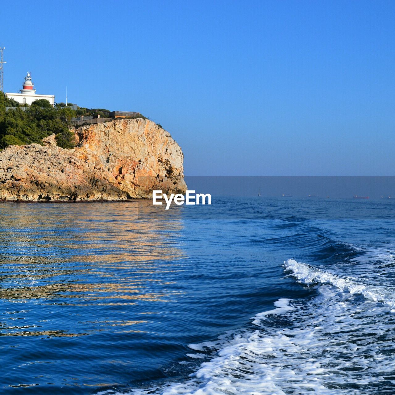 Scenic view of sea against clear sky