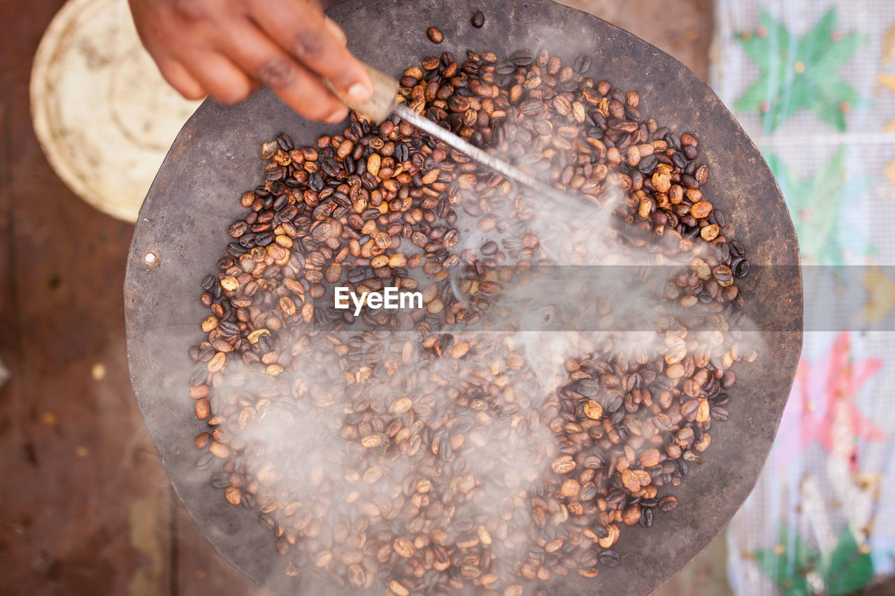 Close-up of man preparing food