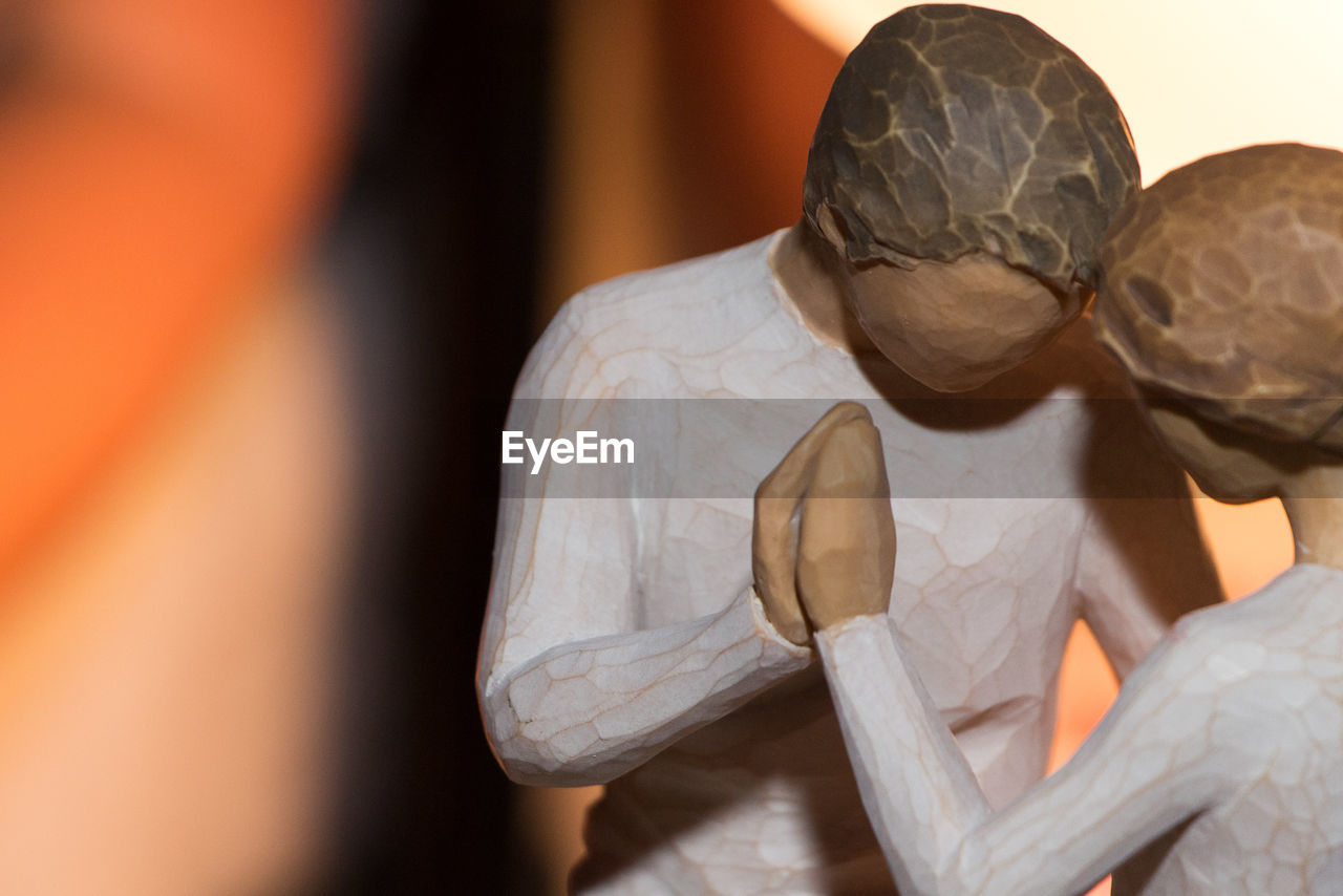 CLOSE-UP OF STATUE