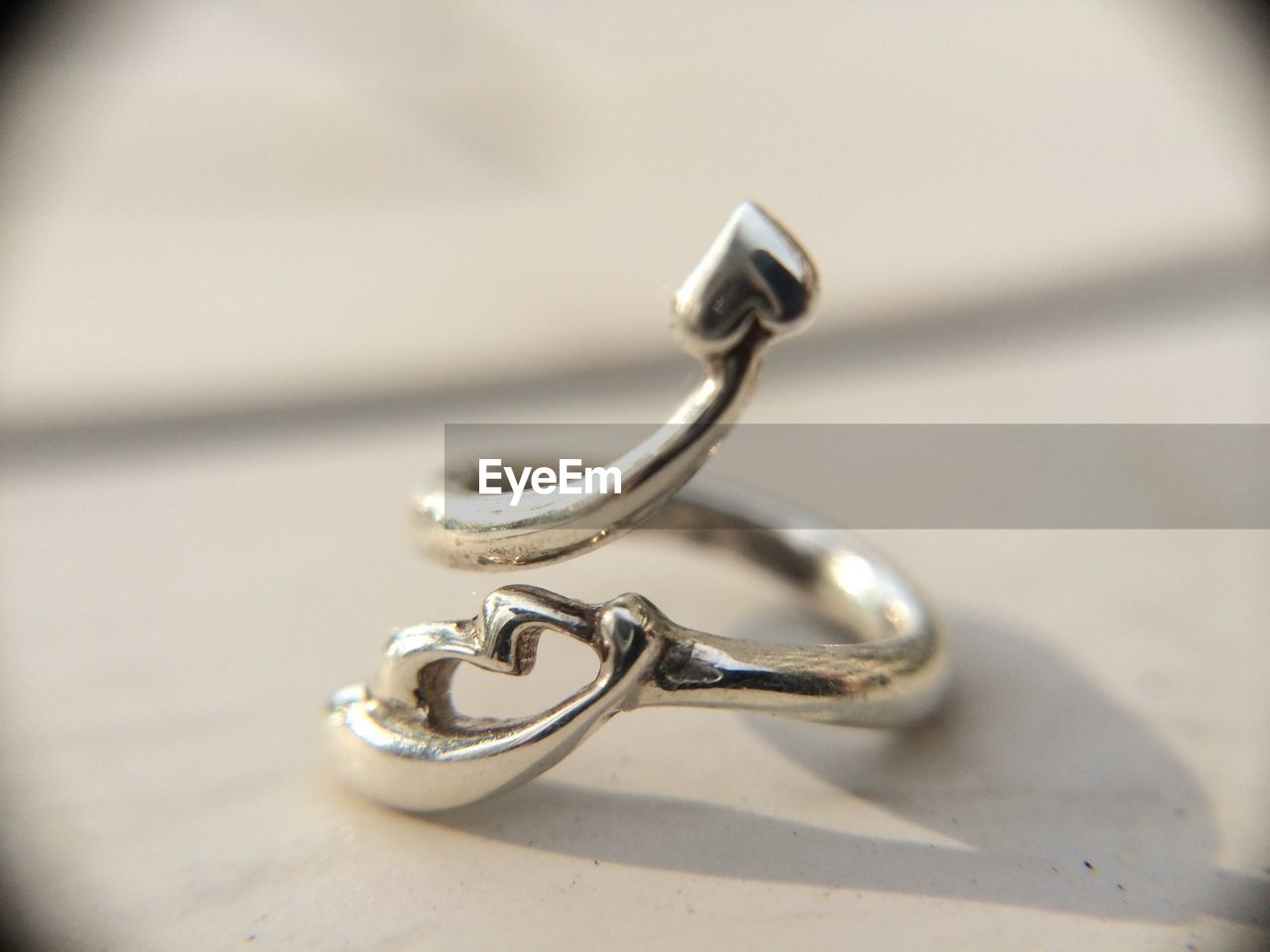 Silver ring with heart and lips components