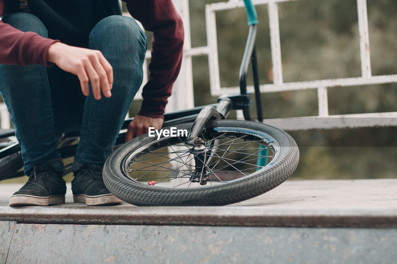 Man sitting on bicycle