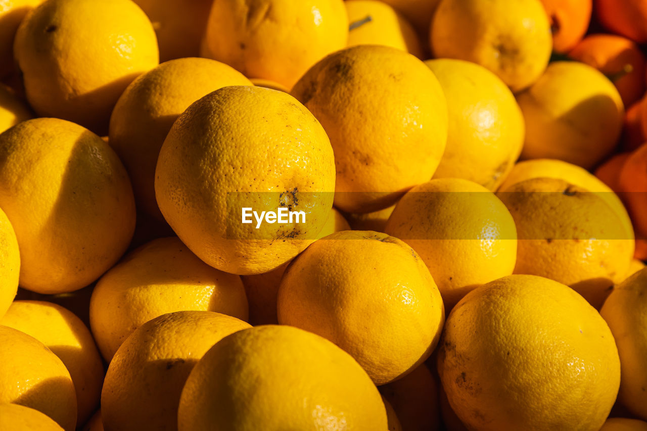 full frame shot of oranges for sale at market