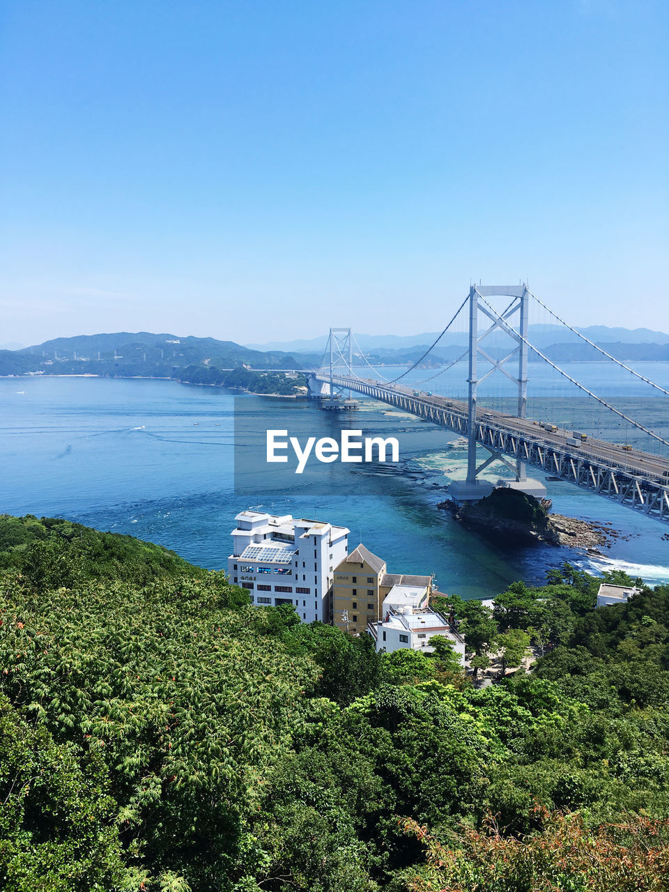 View of suspension bridge over sea