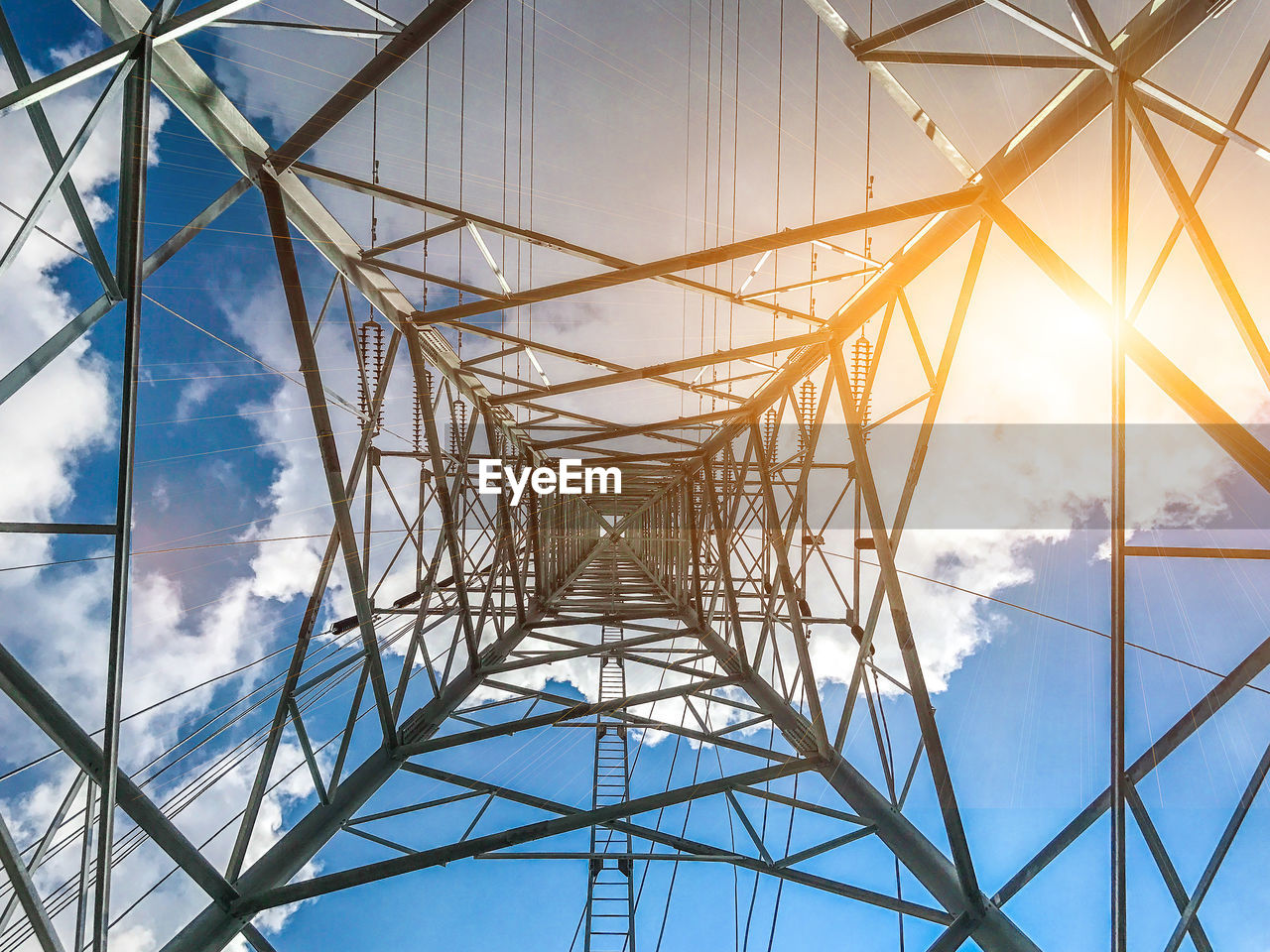 LOW ANGLE VIEW OF ELECTRICITY PYLON