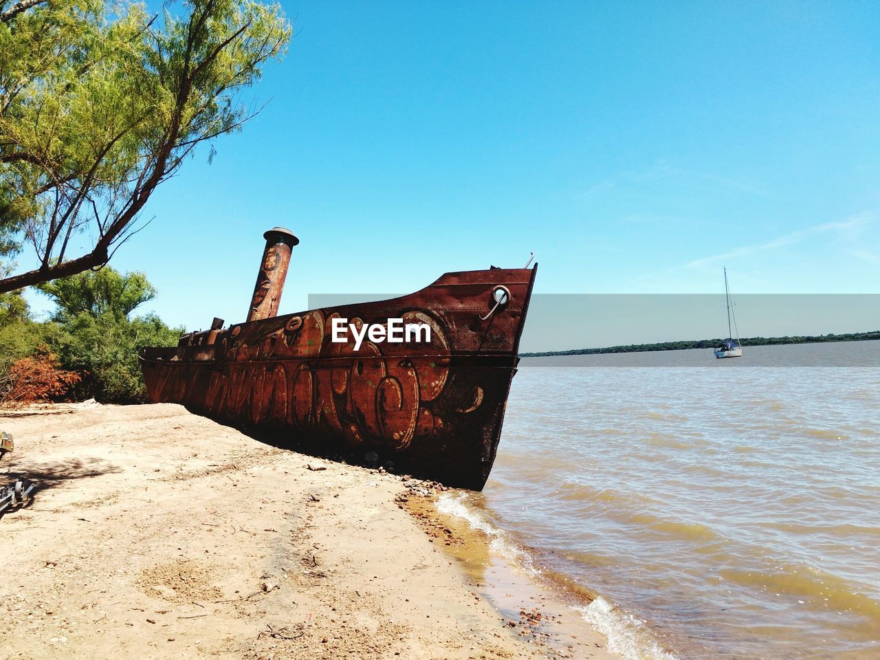 ABANDONED SHIP ON BEACH