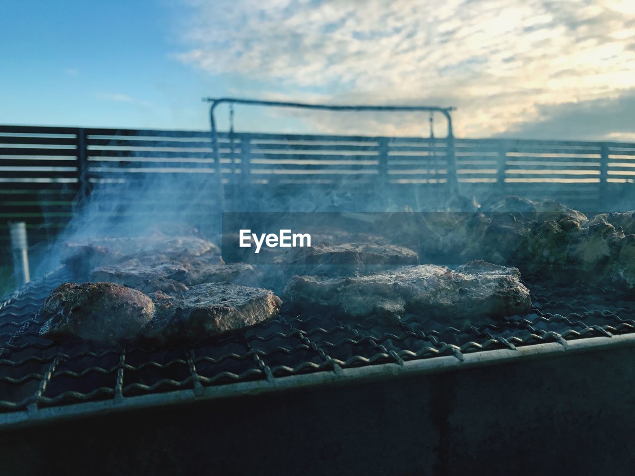 Close-up of meat on barbecue grill