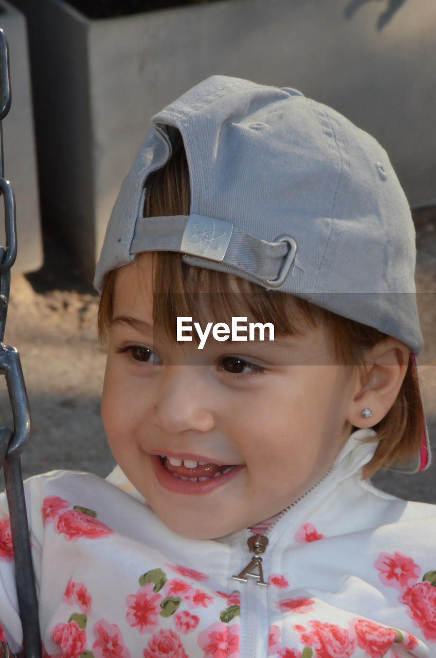 childhood, portrait, child, one person, smiling, looking at camera, headshot, clothing, front view, person, happiness, baby, emotion, female, cute, innocence, toddler, women, day, spring, cheerful, hat, skin, fun, close-up, human face, outdoors, headwear, teeth