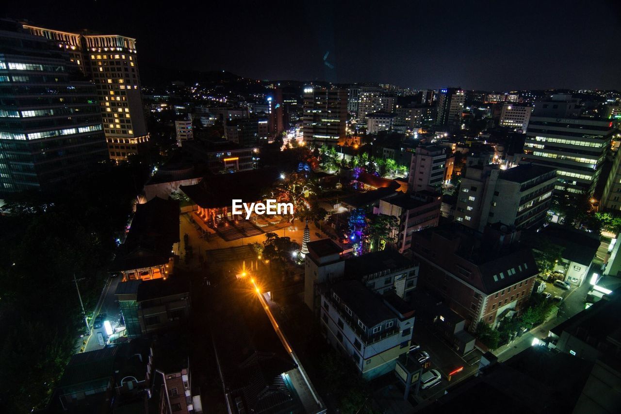 VIEW OF ILLUMINATED CITYSCAPE